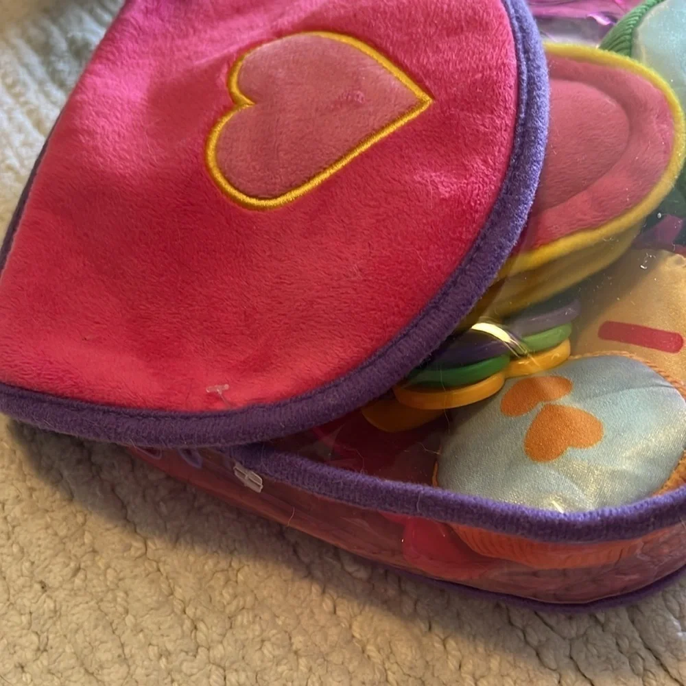 Melissa and Doug purse. Clear and pink.